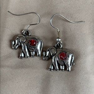 Silver metal elephant earrings